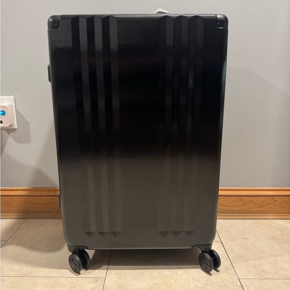 Calpak Black Ambuer Large Luggage